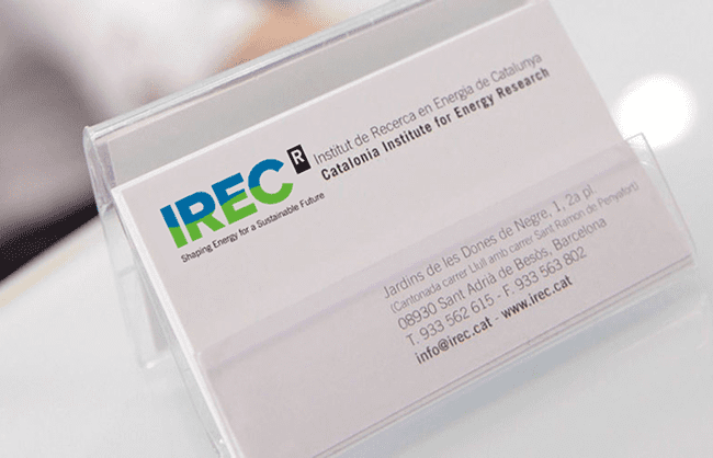 IREC business card showing the institute corporate identity