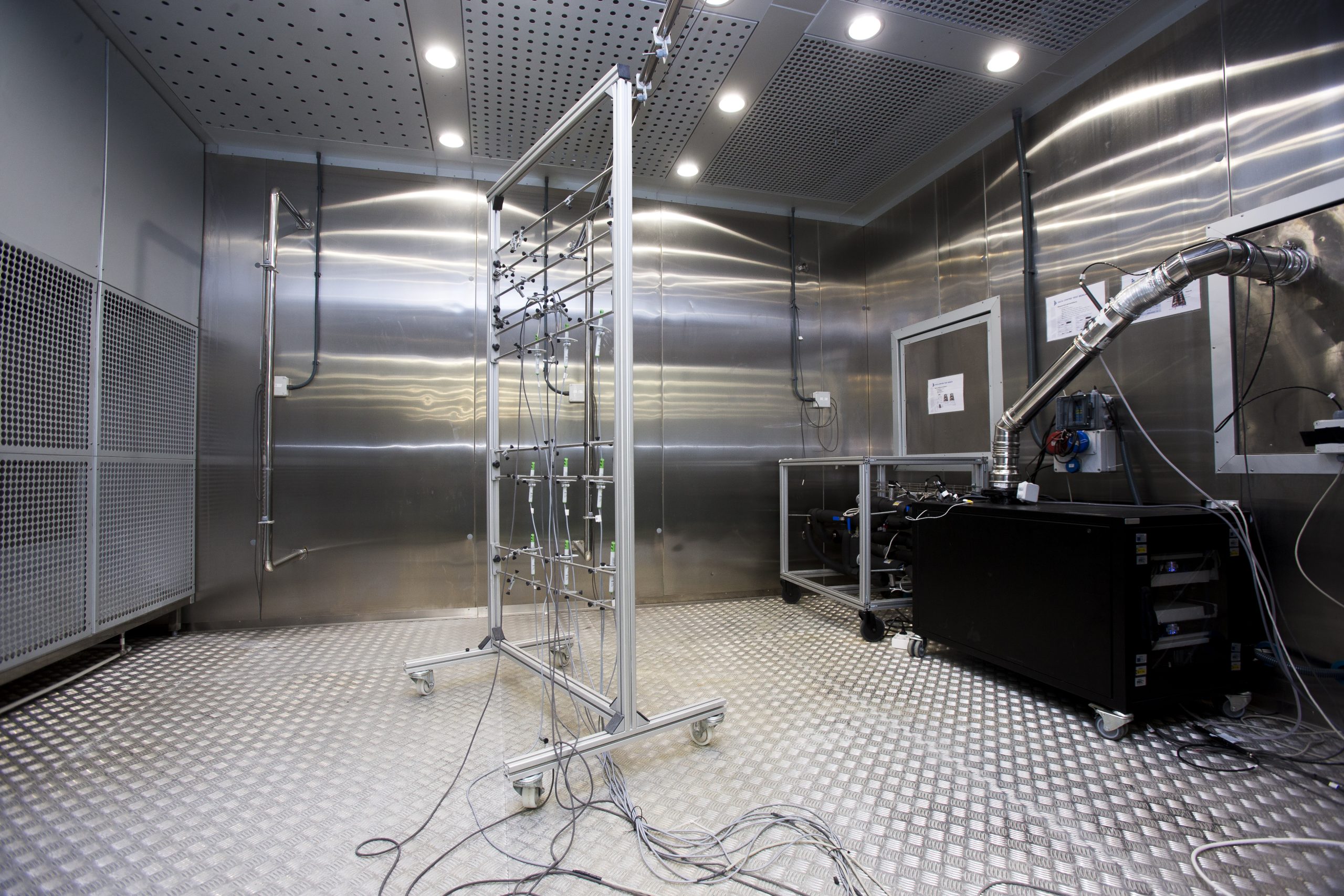 Connected laboratory machine in a research room with multiple experimental systems for urban energy simulation, digital twins and positive energy district modelling.