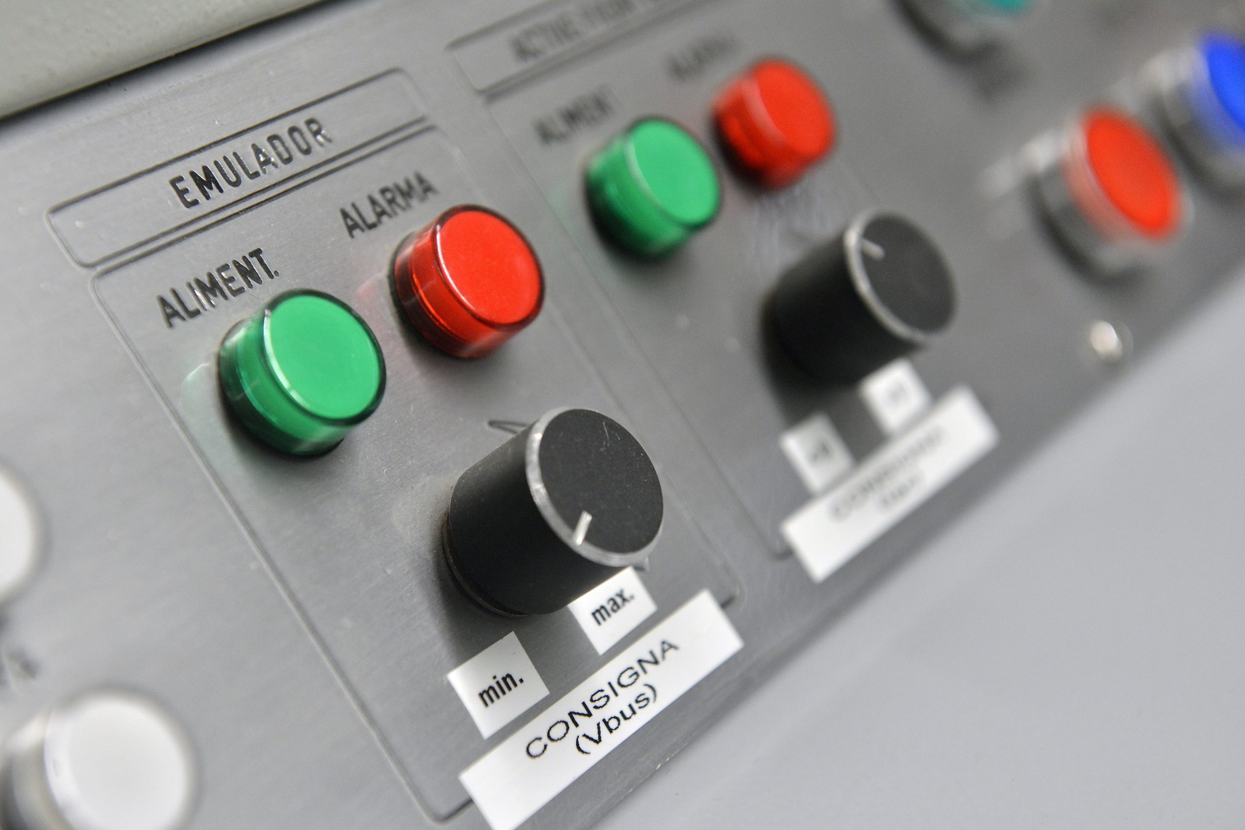 Control panel buttons of advanced electrical grid equipment used for power system stability analysis, renewable energy integration and smart grid resilience research.