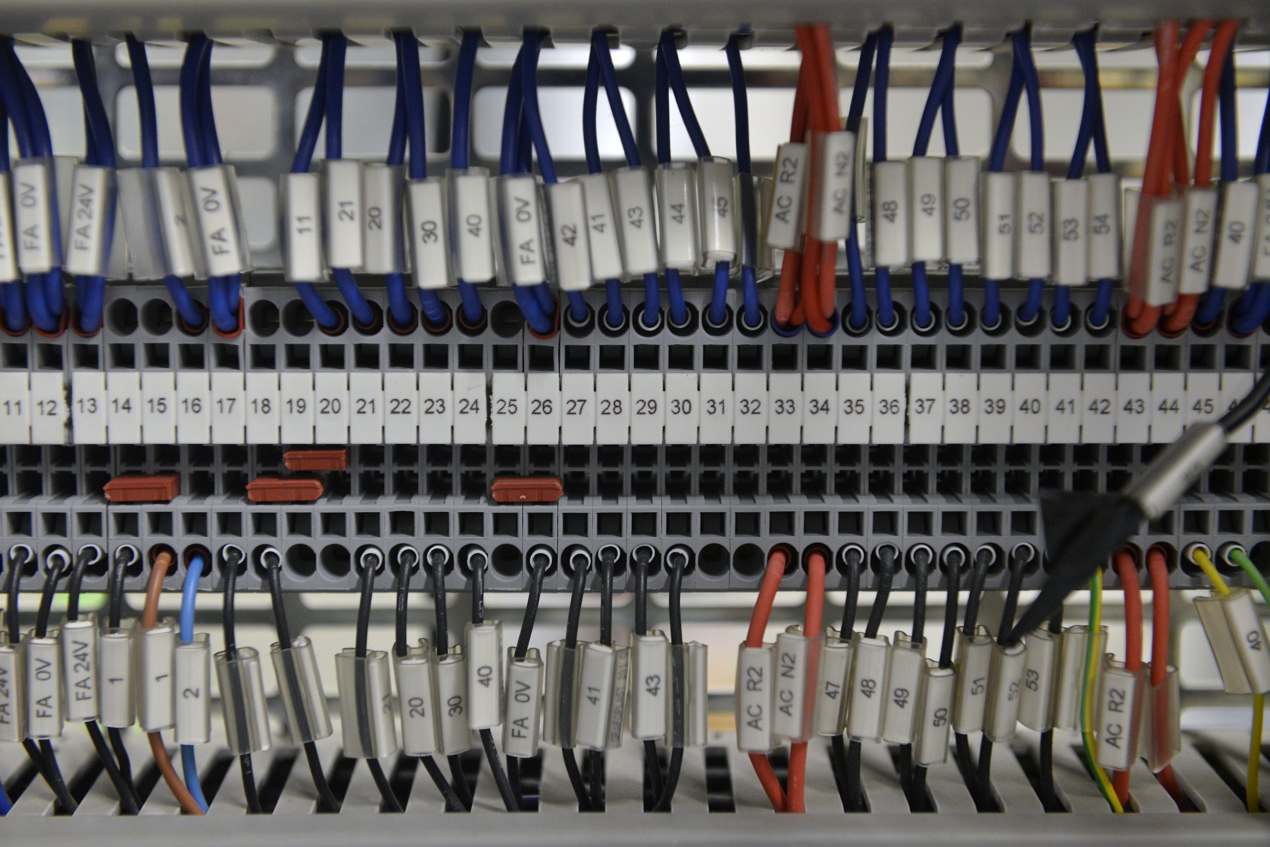 Advanced power electronics laboratory with interconnected cables, converters and control systems for renewable energy integration, energy storage, electric vehicle charging and smart grid applications.