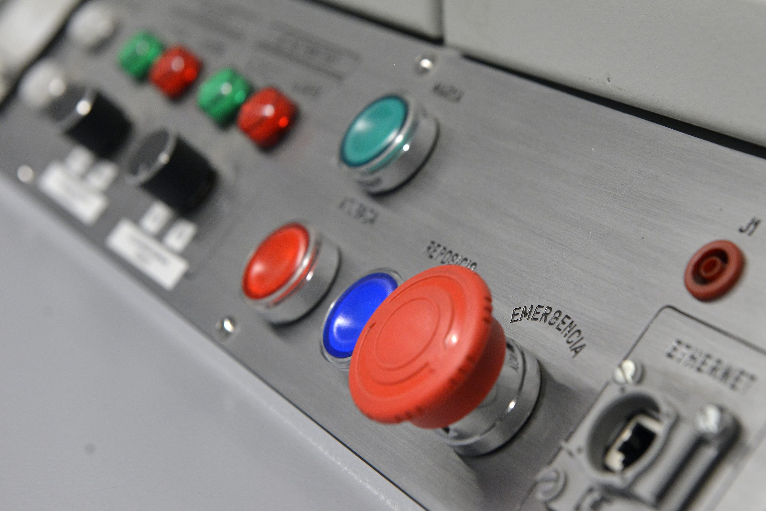 Control buttons on laboratory equipment used for energy storage testing, battery performance evaluation and advanced power systems research.