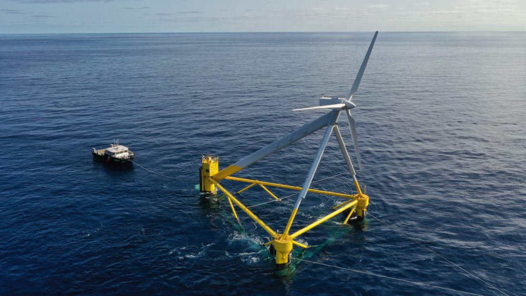 Floating offshore wind turbine on semi-submersible structure in open sea, highlighting PlemCat research framework for renewable energy innovation, environmental assessment, and advanced offshore wind solutions